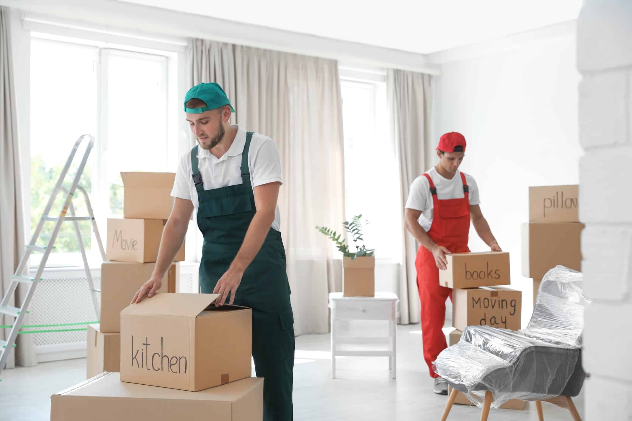 Male movers with boxes